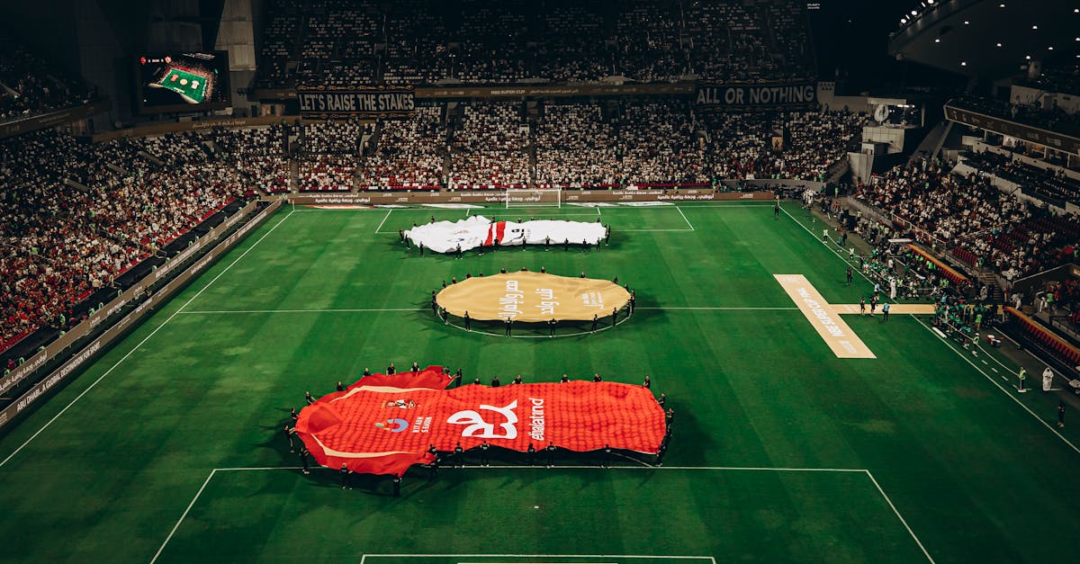 Aerial shot of a football match in Abu Dhabi stadium filled with enthusiastic fans. - 15 Bizarre World Cup Rituals You Won’t Believe Teams Actually Follow
