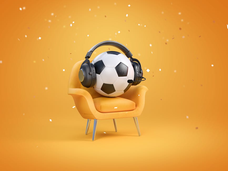 A soccer ball wearing headphones sits on a stylish chair, set against an orange background with confetti. World Cup Fan Anthems