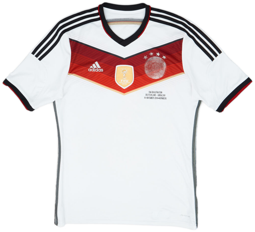 Germany 2014 white tech-fabric World Cup jersey symbolizing modern performance.