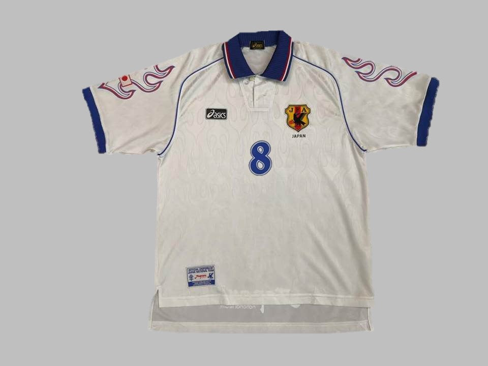 Japan 1998 white and blue World Cup jersey featuring samurai design elements.