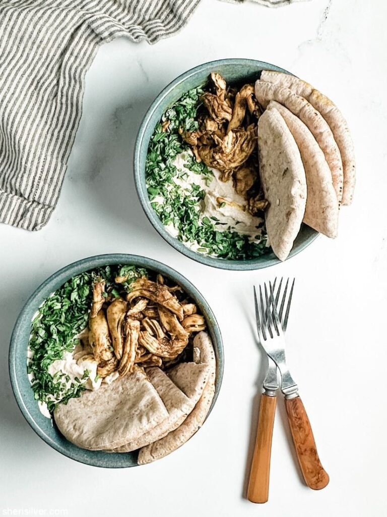 Middle Eastern hummus and shawarma plates during football celebrations.
