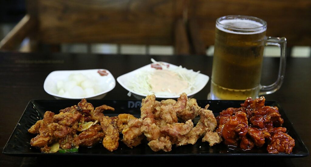 South Korean chimaek fried chicken and beer at football watch parties.