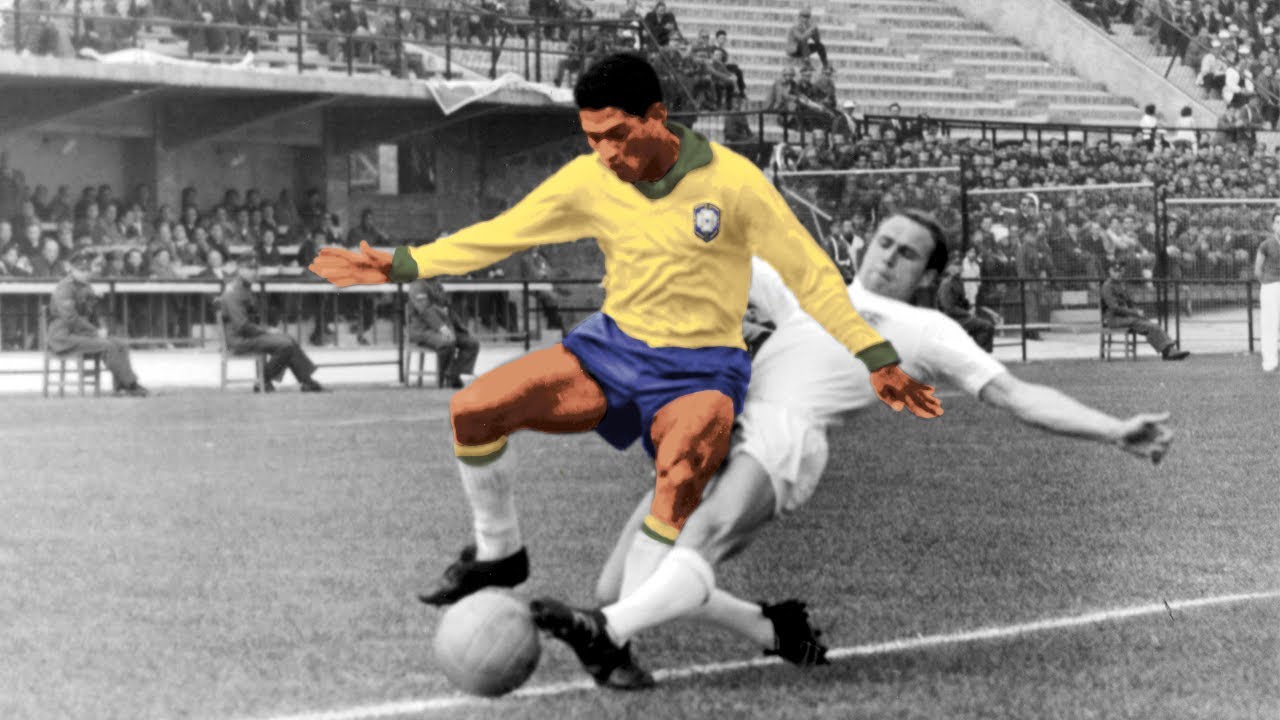 Brazil’s Garrincha dribbling past defenders in 1962 World Cup.