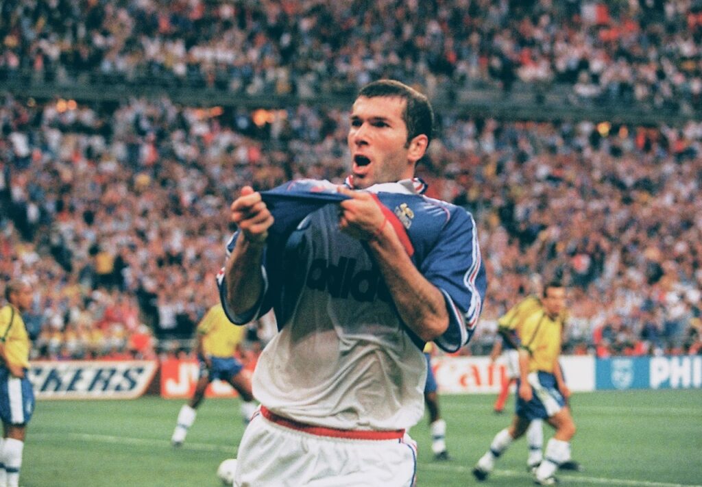 Zinedine Zidane celebrating 1998 World Cup Final goals for France.